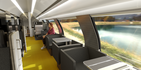 Bahn Neue Doppelstockzüge von Alstom Gang eines Zugabteils mit mehreren Sesseln und Sitzgruppen.