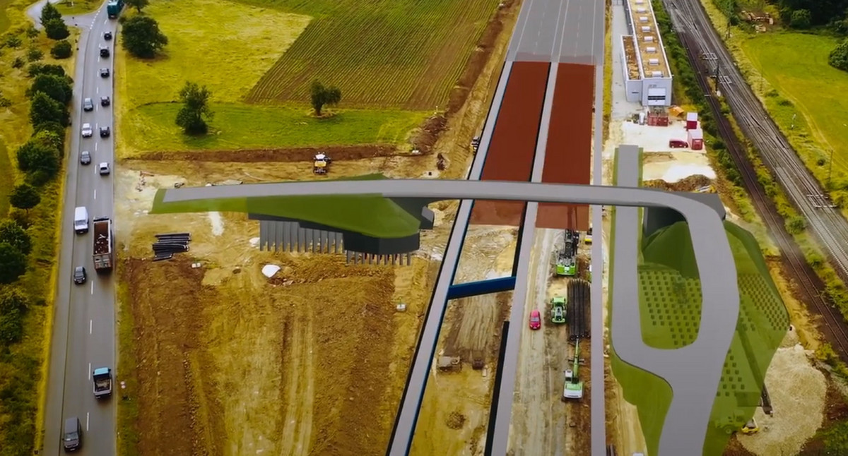 3D-Animation einer Brücke über eine mehrspurige Straße.