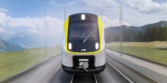 Bahn Neue Doppelstockzüge von Alstom Vorderansicht des Triebkopfes eines gelb-schwarz lackierten Zuges.