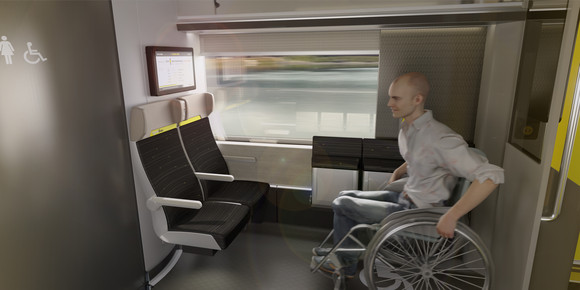 Bahn Neue Doppelstockzüge von Alstom In einem barrierefreien Bereich in einem Zug sitzt ein Mann mit seinem Rollstuhl